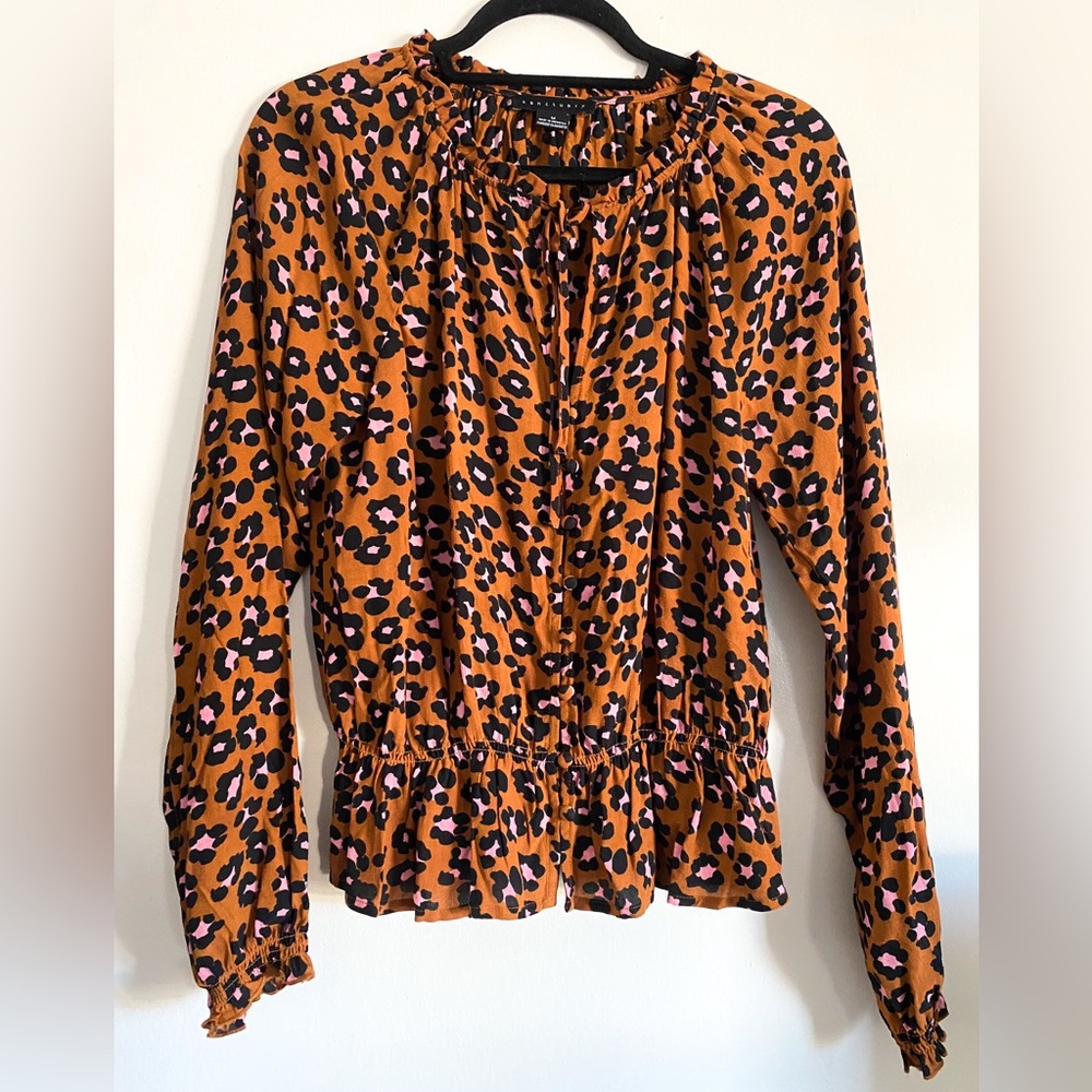 ✨ SANCTUARY peplum leopard print top with tie neck